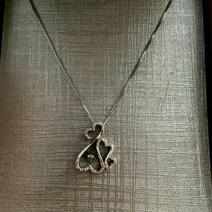 Dancing diamond infinity necklace